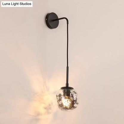Black metal wall light with clear glass globe and delicate floral etchings for flower deco cloth bedroom decor