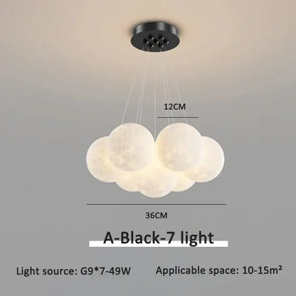 Modern gold cloud bubble ball led pendant lights feature seven frosted moon-like spheres from black ceiling mount