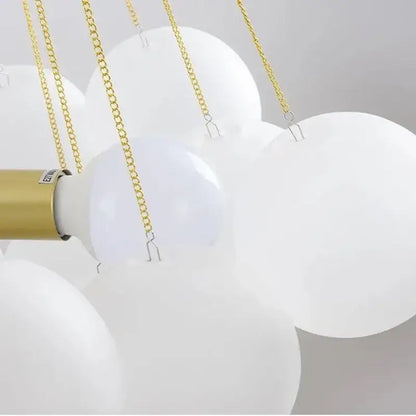 Modern gold cloud glass ball led chandelier with white spherical glass ball led pendants suspended by gold-toned chains