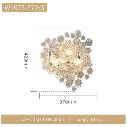 Modern gold cloud led ceiling chandelier with gold-toned wall sconce featuring textured circular glass discs
