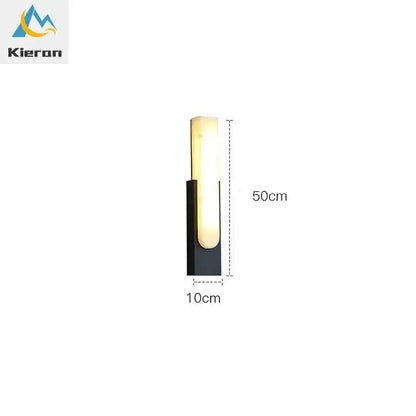 Modern black and cream decorbites cloud stone led wall light with sleek minimalist design for bedroom sconce lighting