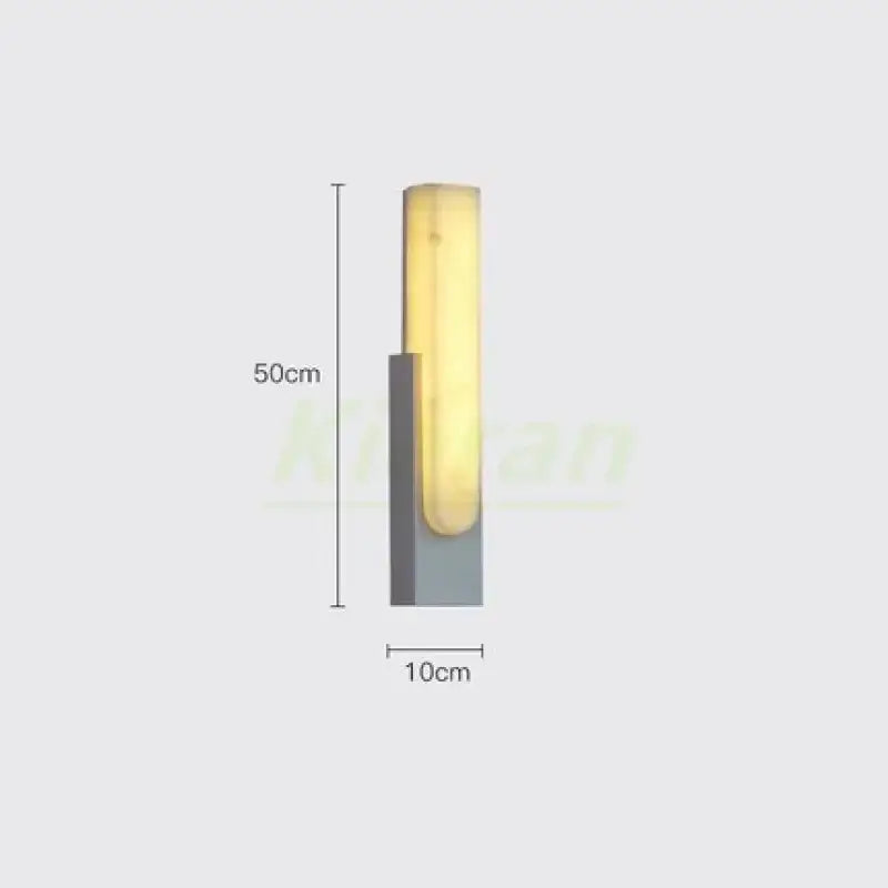 Modern gold cloud stone led wall light with a sleek rectangular warm yellow illuminated panel on a matte gray base