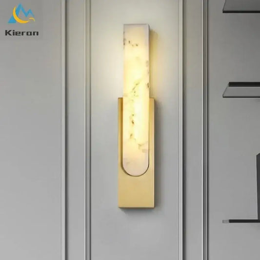 Modern gold cloud stone led wall light featuring a gold-toned rectangular marble-like panel emitting warm light
