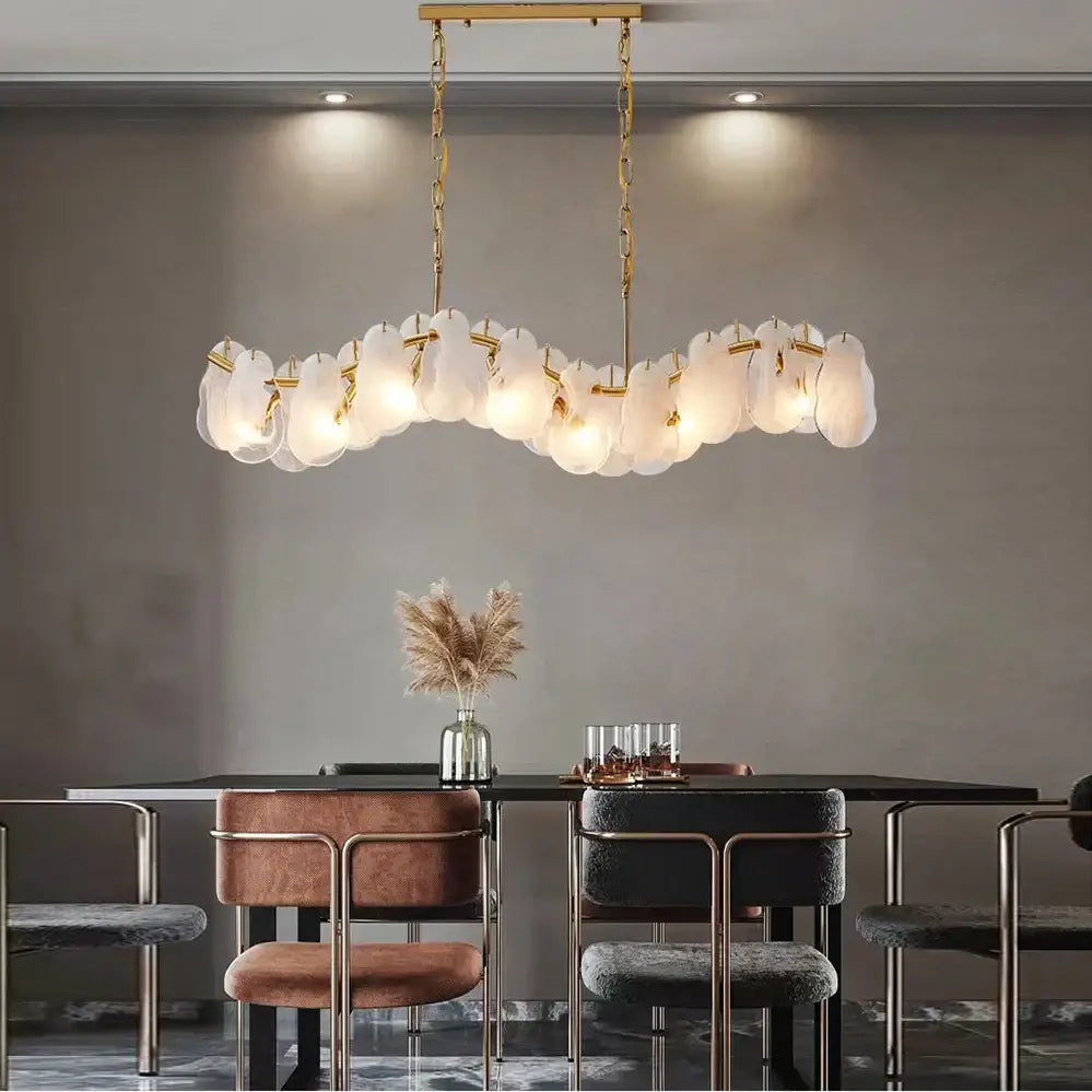 Modern gold cloudy glass chandeliers featuring frosted glass pendant shades suspended by chains for living room decorbites cloudy glass lighting