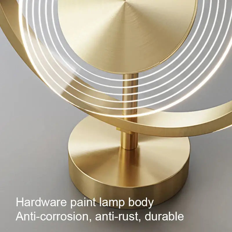 Modern gold finished table lamp with concentric led rings and brushed metal base for decorbites led ceiling light use