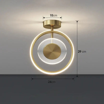 Modern gold-toned ceiling light with concentric led rings and brushed metal finish for decorbites led ceiling use