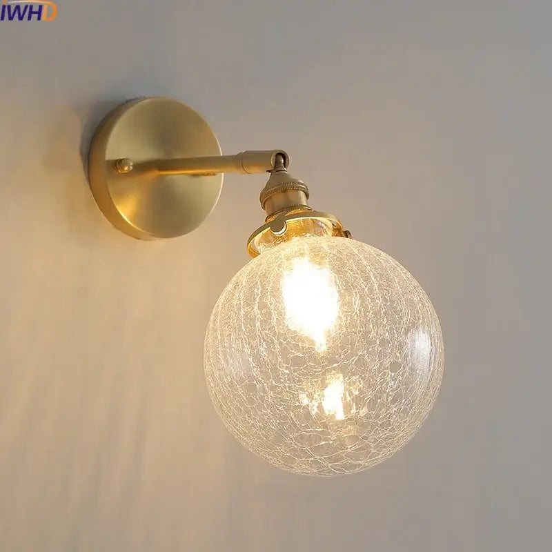Modern gold crackled glass led wall lights featuring a gold-toned spherical glass shade for bedroom decorbites led wall sconce