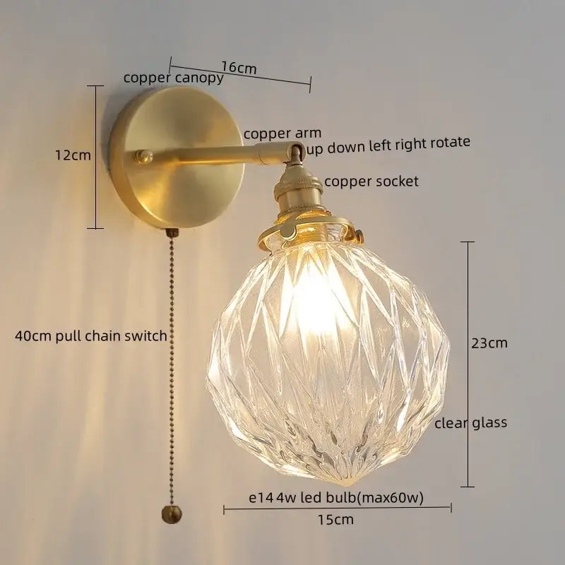 Modern gold crackled glass led wall lights feature a brass-finished copper arm and clear faceted globe for warm decorbites led wall lighting