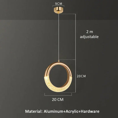 Modern gold crescent pendant light with textured acrylic and aluminum frame features adjustable height for dining settings