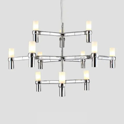 Modern gold crown major chandelier with chrome finish bamboo-inspired design and warm glowing cylindrical bulbs decorbites crown major
