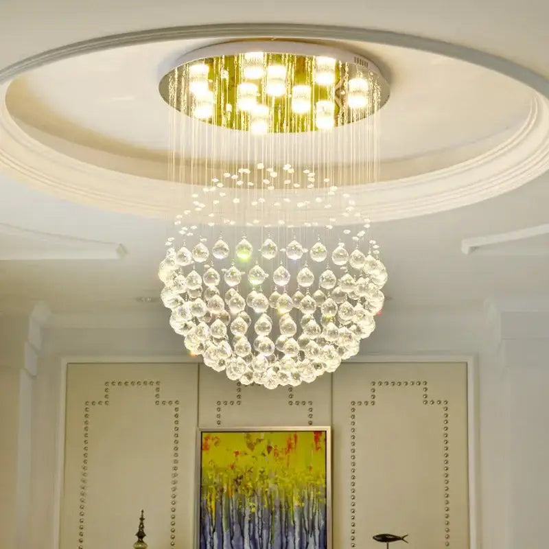 Modern gold crystal ball led ceiling chandelier with circular fixture and cascading clear decorbites k9 crystal teardrops