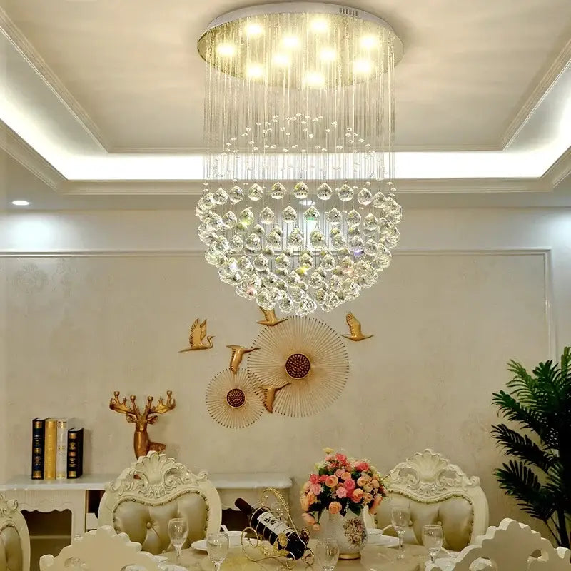 Modern gold crystal ball led chandelier with cascading clear glass droplets and warm lights for dining room decorbites crystal ball