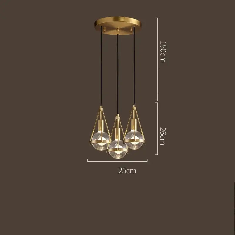 Modern gold crystal ball pendant light with brass finish and three glass bulbs suspended by black cords for dining room decorbites crystal ball pendant