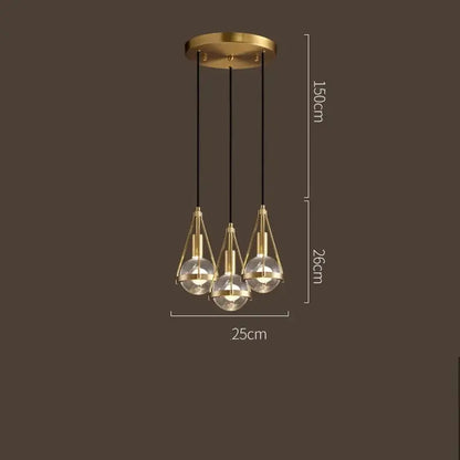 Modern gold crystal ball pendant light with brass finish and three glass bulbs suspended by black cords for dining room decorbites crystal ball pendant