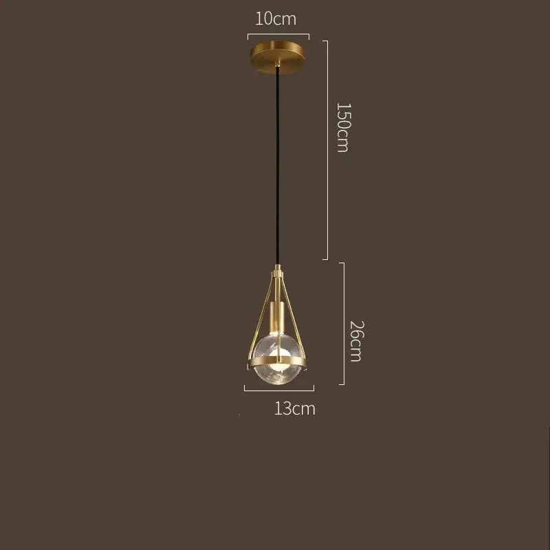 Modern gold crystal ball pendant light featuring a gold-toned geometric frame with a clear bulb for dining room decorbites pendant lights