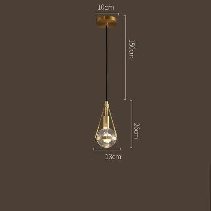 Modern gold crystal ball pendant light featuring a gold-toned geometric frame with a clear bulb for dining room decorbites pendant lights