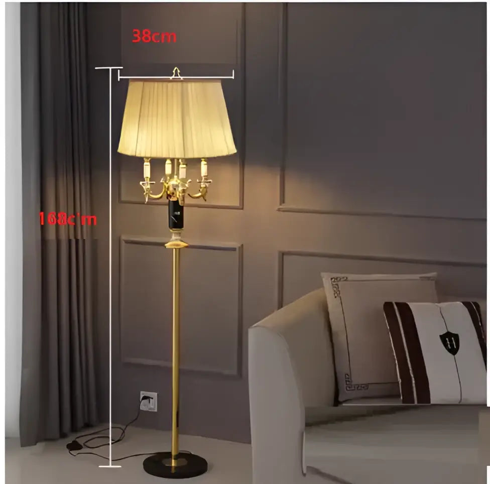 Modern gold crystal black table lamp featuring gold-toned floor lamp with cream pleated shade and chandelier-style arms