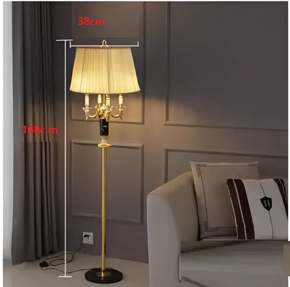 Modern gold crystal black table lamp featuring gold-toned floor lamp with cream pleated shade and chandelier-style arms