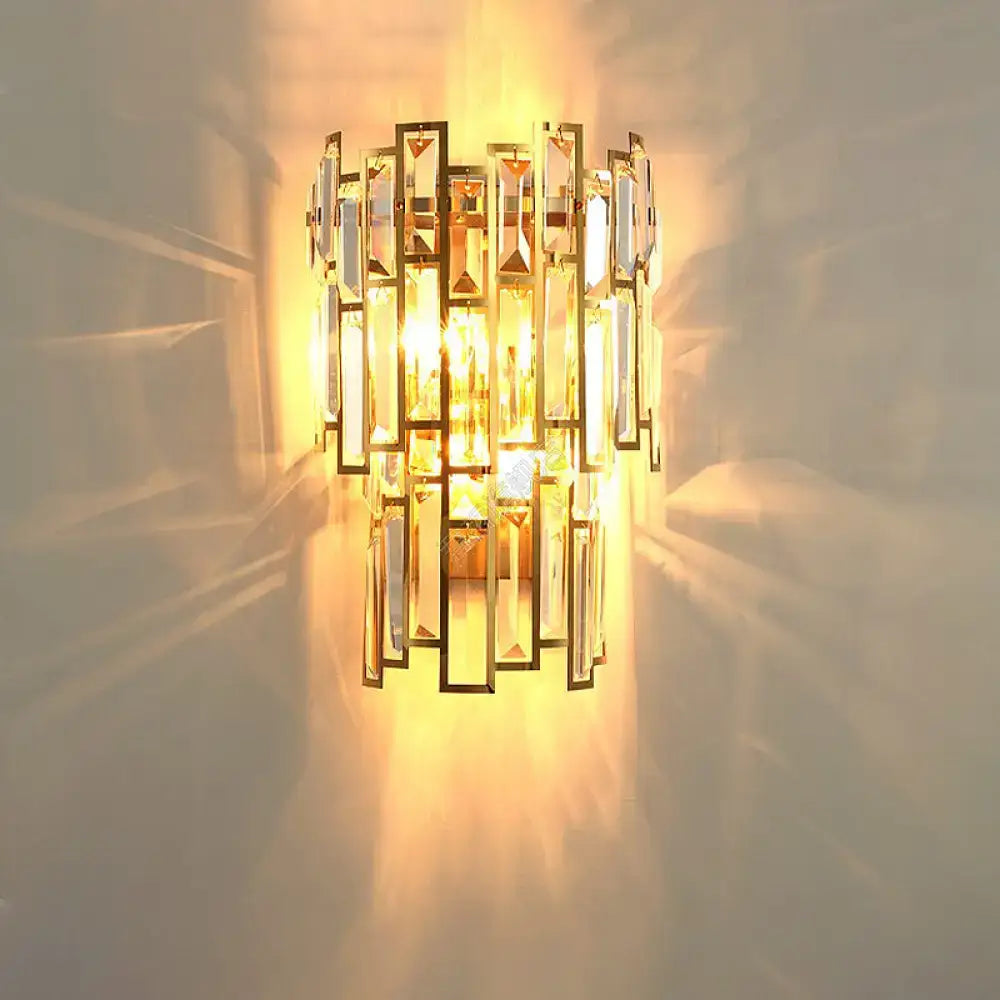 Modern gold crystal block sconce lighting wall lamp with cascading rectangular crystal facets for bedroom use