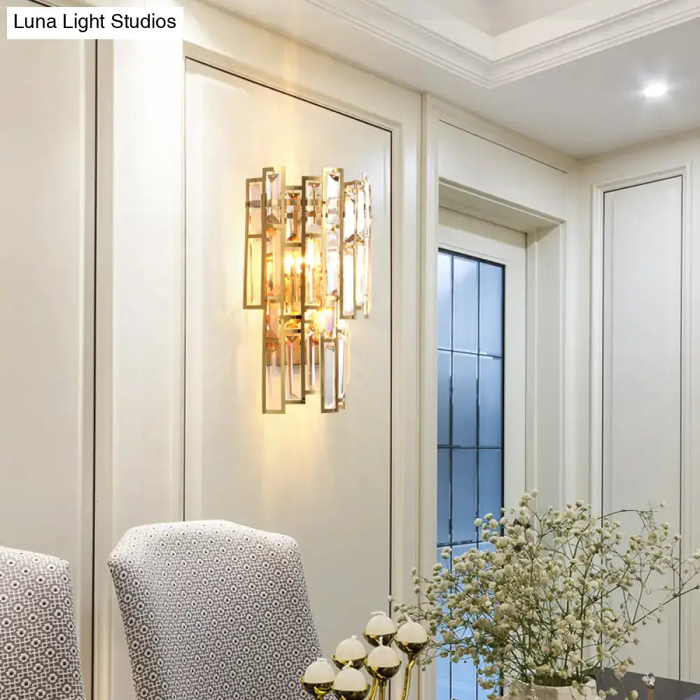 Modern gold crystal block sconce lighting wall lamp with vertical crystal bars and warm glowing light for bedroom