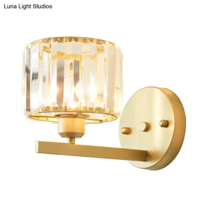 Modern gold crystal block wall sconce with faceted crystal shade for elegant bedroom lighting on block wall