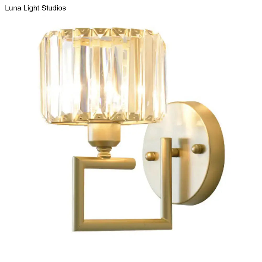 Modern gold crystal block wall sconce with faceted crystal block shade for elegant bedroom lighting