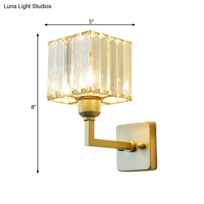 Modern gold crystal block wall sconce with faceted crystal shade ideal for bedroom lighting on block wall