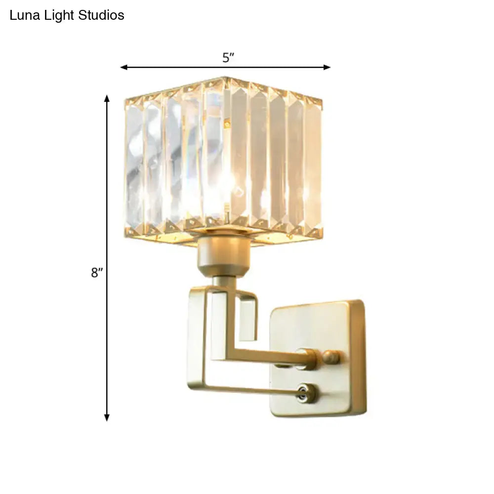 Modern gold crystal block wall sconce with faceted crystal block shade for elegant bedroom lighting