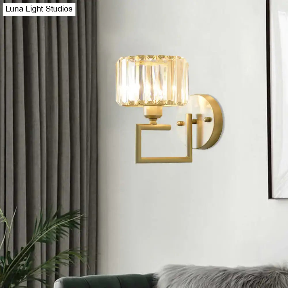 Modern gold crystal block wall sconce with faceted crystal shade for stylish bedroom lighting on block wall