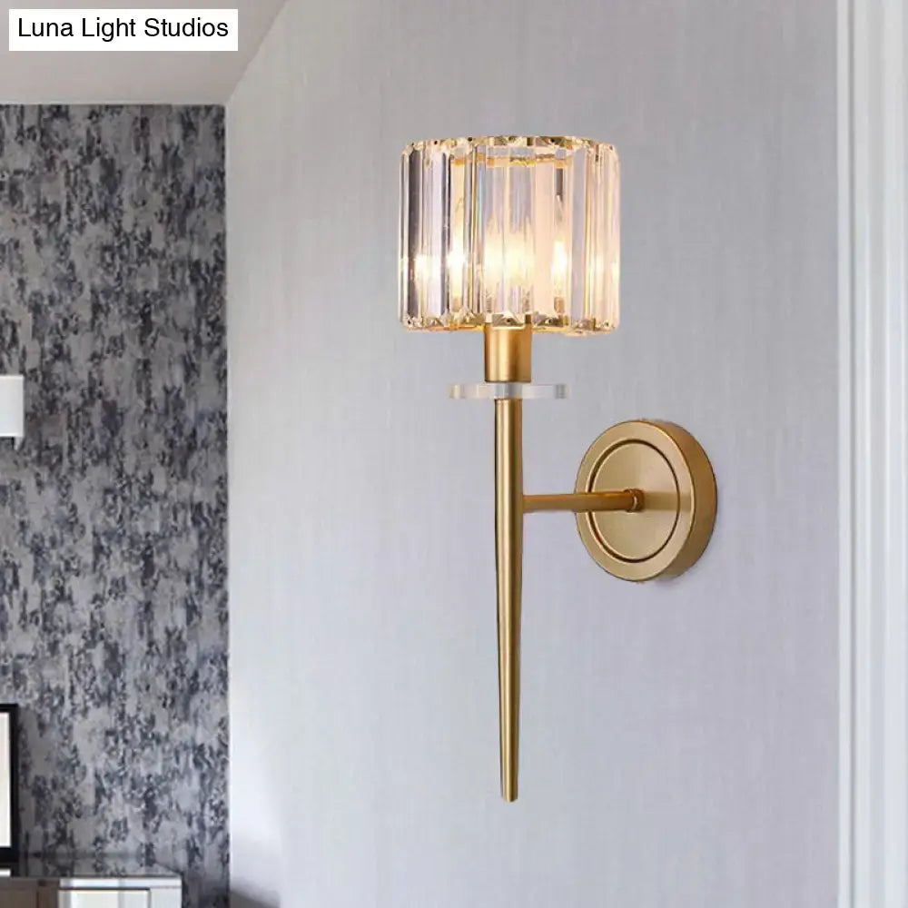 Gold-toned decorbites wall sconce with iron pencil arm and cylindrical crystal shade for led incandescent fluorescent bulbs