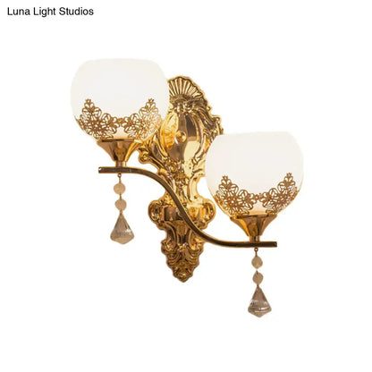 Modern gold crystal bowl wall sconce with lace cutout frosted glass shades and crystal teardrop pendants for living room