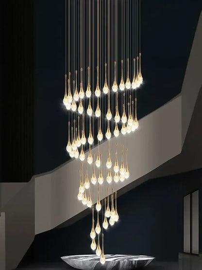 Modern gold crystal bubble chandelier teardrop pendant with warm lights above sleek silver bowl decorbites crystal bubble