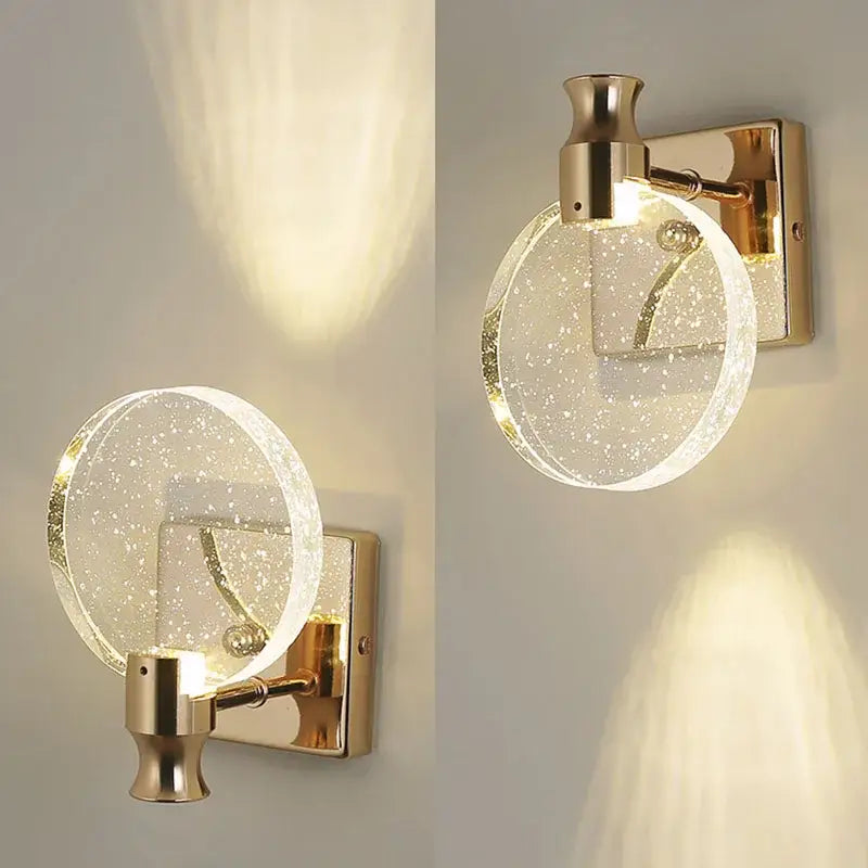 Modern gold crystal bubble wall lamp with a circular clear glass shade filled with sparkling glitter for bedroom decorbites wall lamp