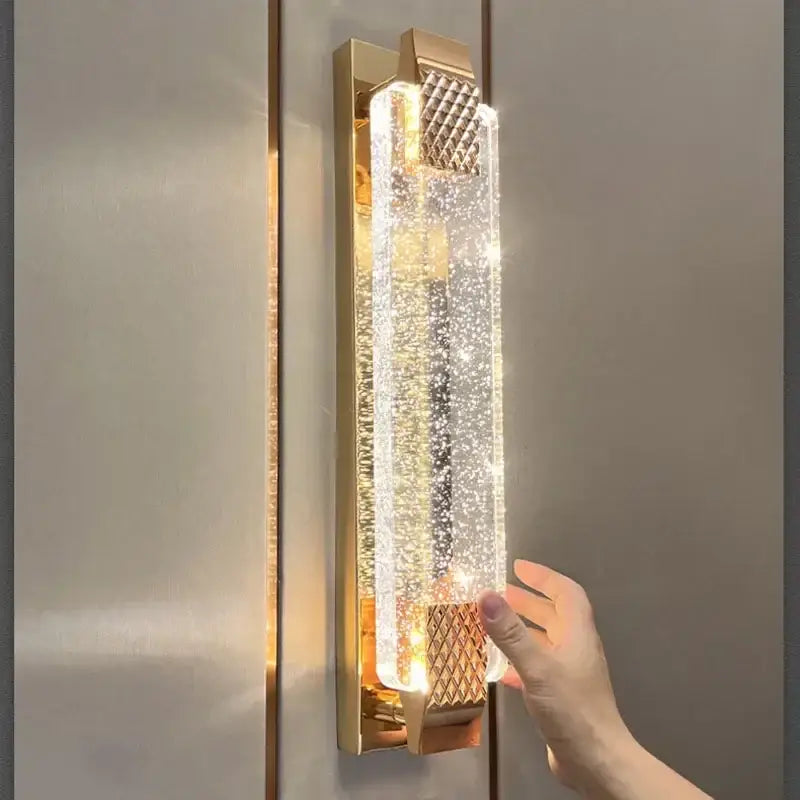 Modern gold crystal bubble wall lights with clear textured glass and glowing internal lights for elegant decorbites crystal bubble wall decor