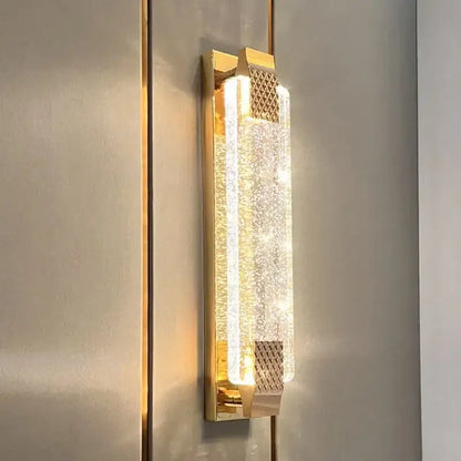 Modern gold crystal bubble wall sconce with textured translucent crystal panel diffusing warm light for wall lights decorbites crystal bubble