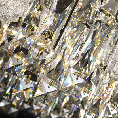 Modern gold crystal ceiling chandelier featuring clear faceted crystal prisms with gold-toned metal hooks for dining room decorbites crystal ceiling