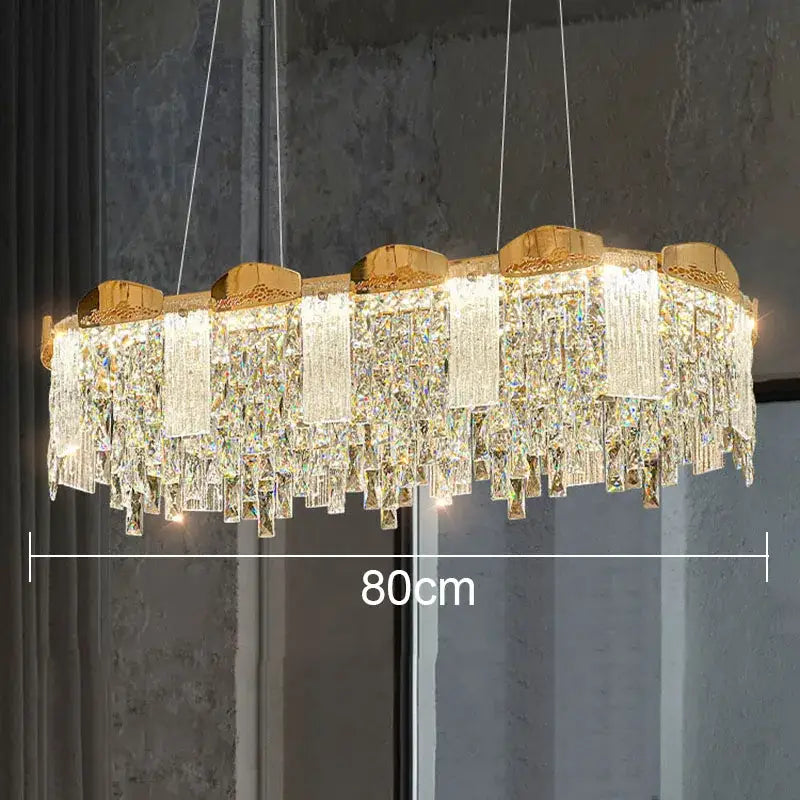 Modern gold crystal ceiling chandelier with cascading crystal prisms and illuminated panels for dining room decorbites ceiling chandelier