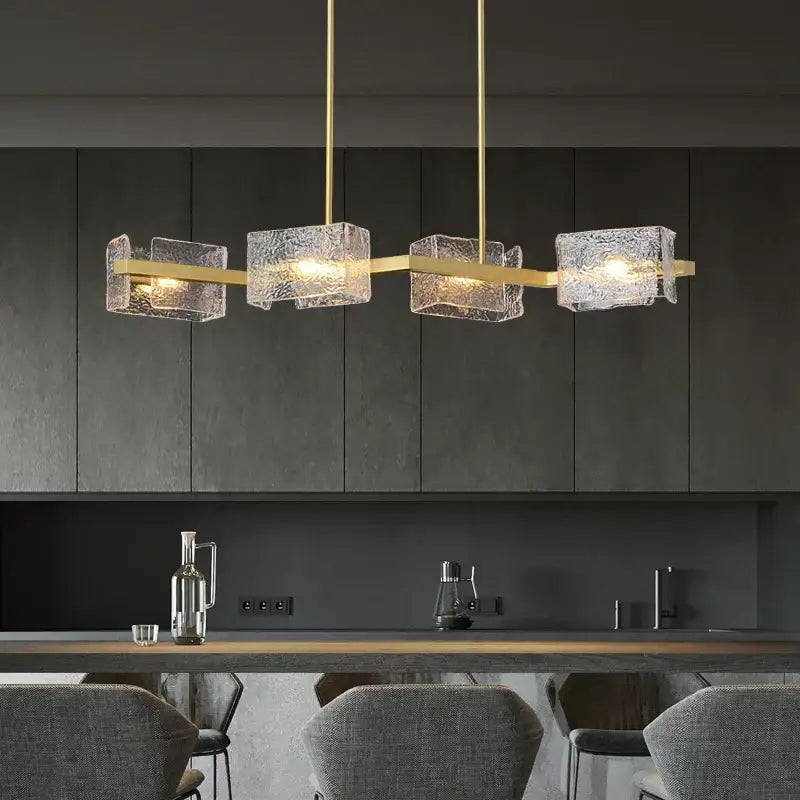 Modern gold crystal ceiling chandelier with textured translucent glass cubes suspended by slender rods decorbites crystal ceiling