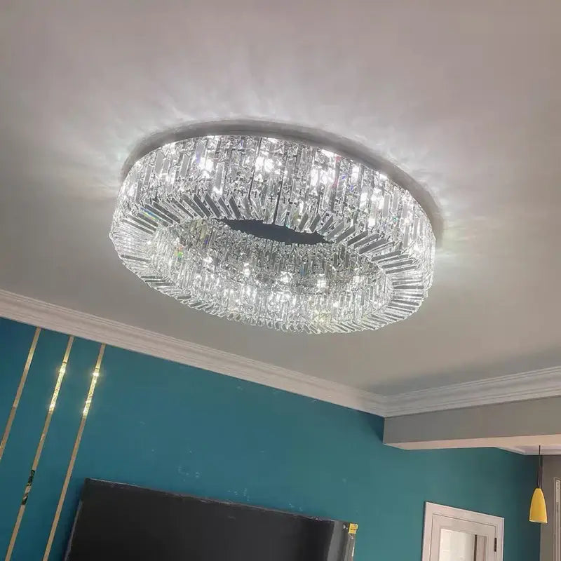 Modern gold crystal chandelier ceiling light with two concentric rings of clear glass prisms by decorbites elegant gold