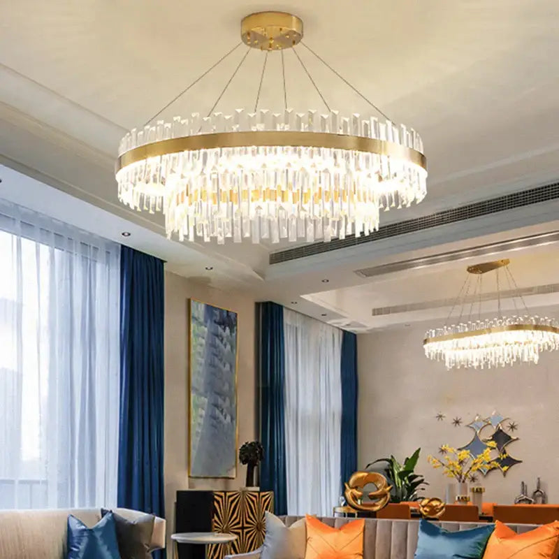 Modern gold decorbites circular crystal chandelier lighting fixture with clear prisms for dining room decor