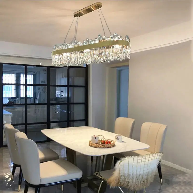 Modern gold crystal circle ceiling chandelier with rectangular metal frame and cascading clear crystal droplets for dining room decorbites crystal circle