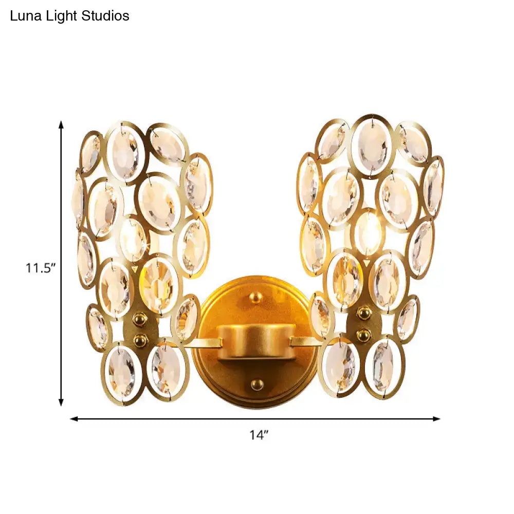 Modern gold crystal circles wall light with two curved arms and faceted crystal elements for bedroom lighting