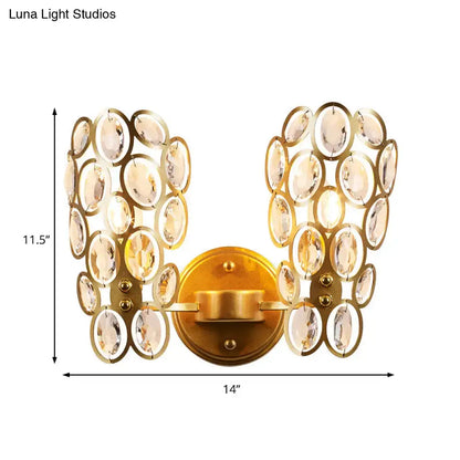 Modern gold crystal circles wall light with two curved arms and faceted crystal elements for bedroom lighting