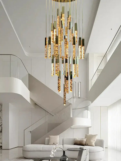 A modern gold-toned decorbites crystal circular staircase chandelier with cascading glass elements for villa foyer lighting