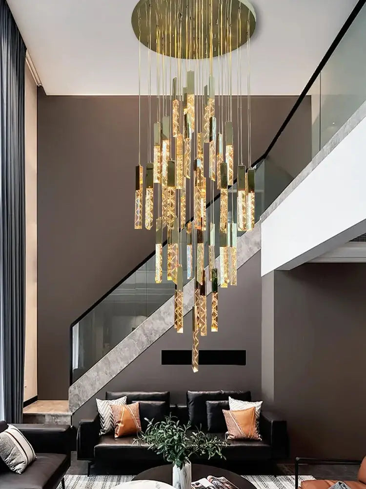 Modern gold crystal circular staircase chandelier with cascading cylindrical pendants for villa foyer decorbites crystal circular