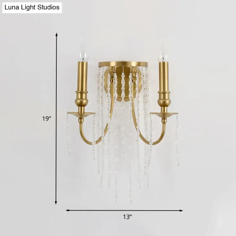 Modern gold crystal corridor wall lamp with two candle-style arms and cascading clear crystal beads for corridor wall lighting