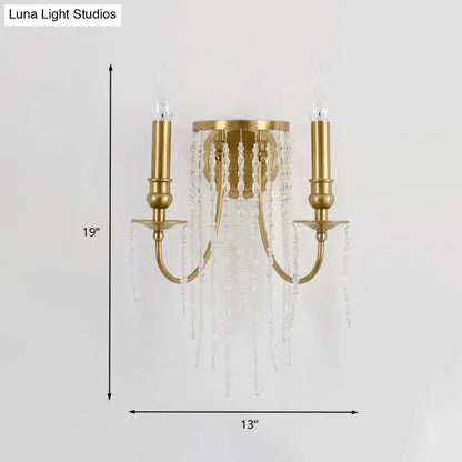 Modern gold crystal corridor wall lamp with two candle-style arms and cascading clear crystal beads for corridor wall lighting
