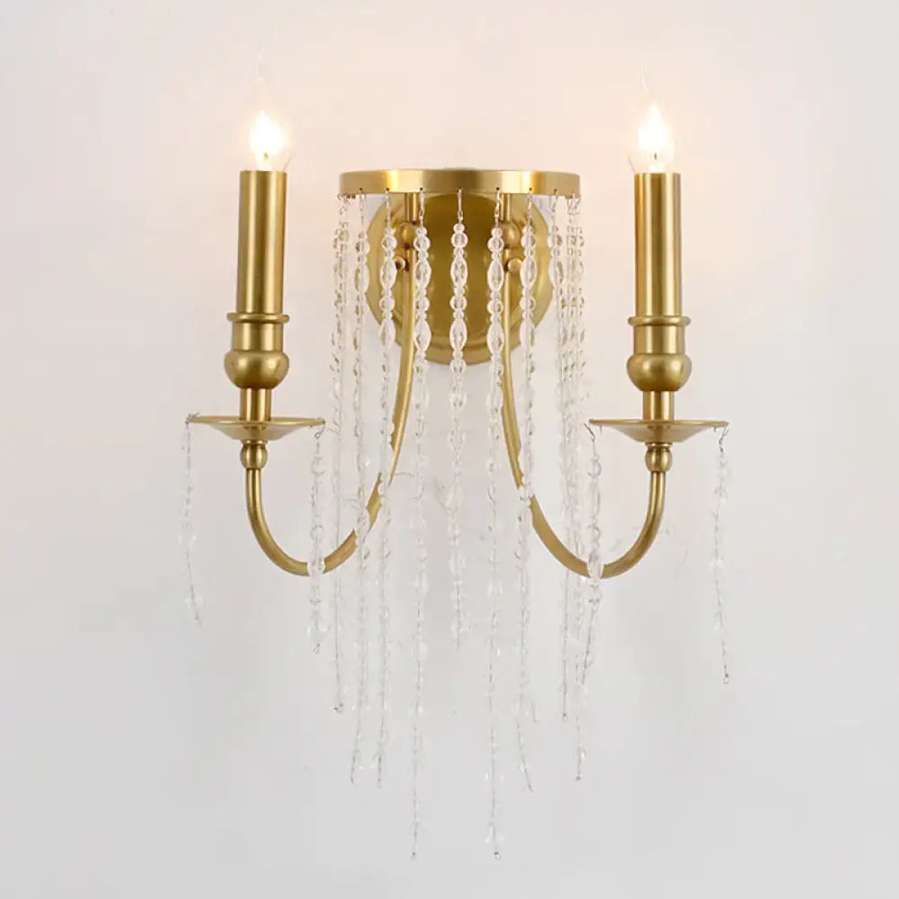 Modern gold crystal corridor wall lamp with two candle-style arms and cascading clear crystal beads for corridor lighting