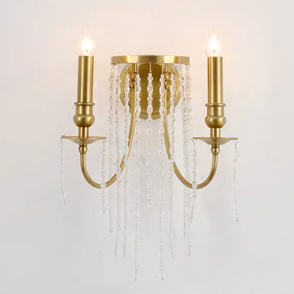 Modern gold crystal corridor wall lamp with two candle-style arms and cascading clear crystal beads for corridor lighting
