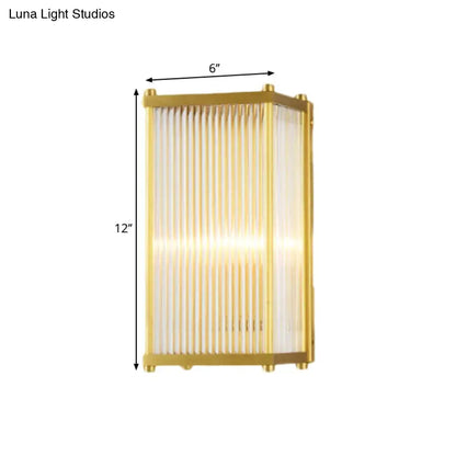 Modern gold crystal cuboid wall sconce light with gold finish and vertical frosted glass panels direct wired electric